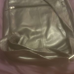 Leather back pack/ messenger bag